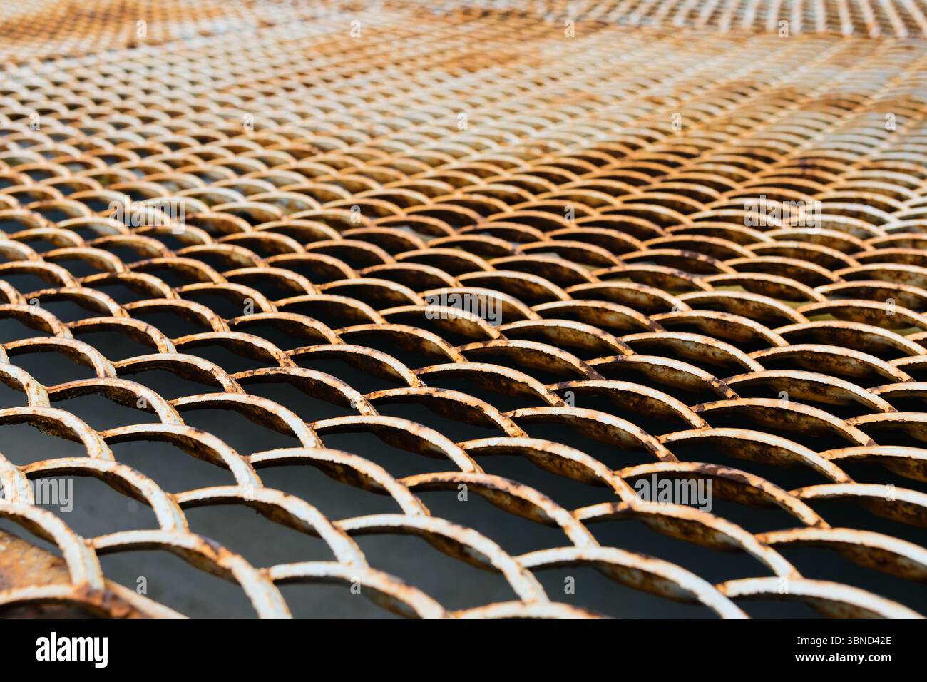 Corroded steel grating floor. Background Stock Photo