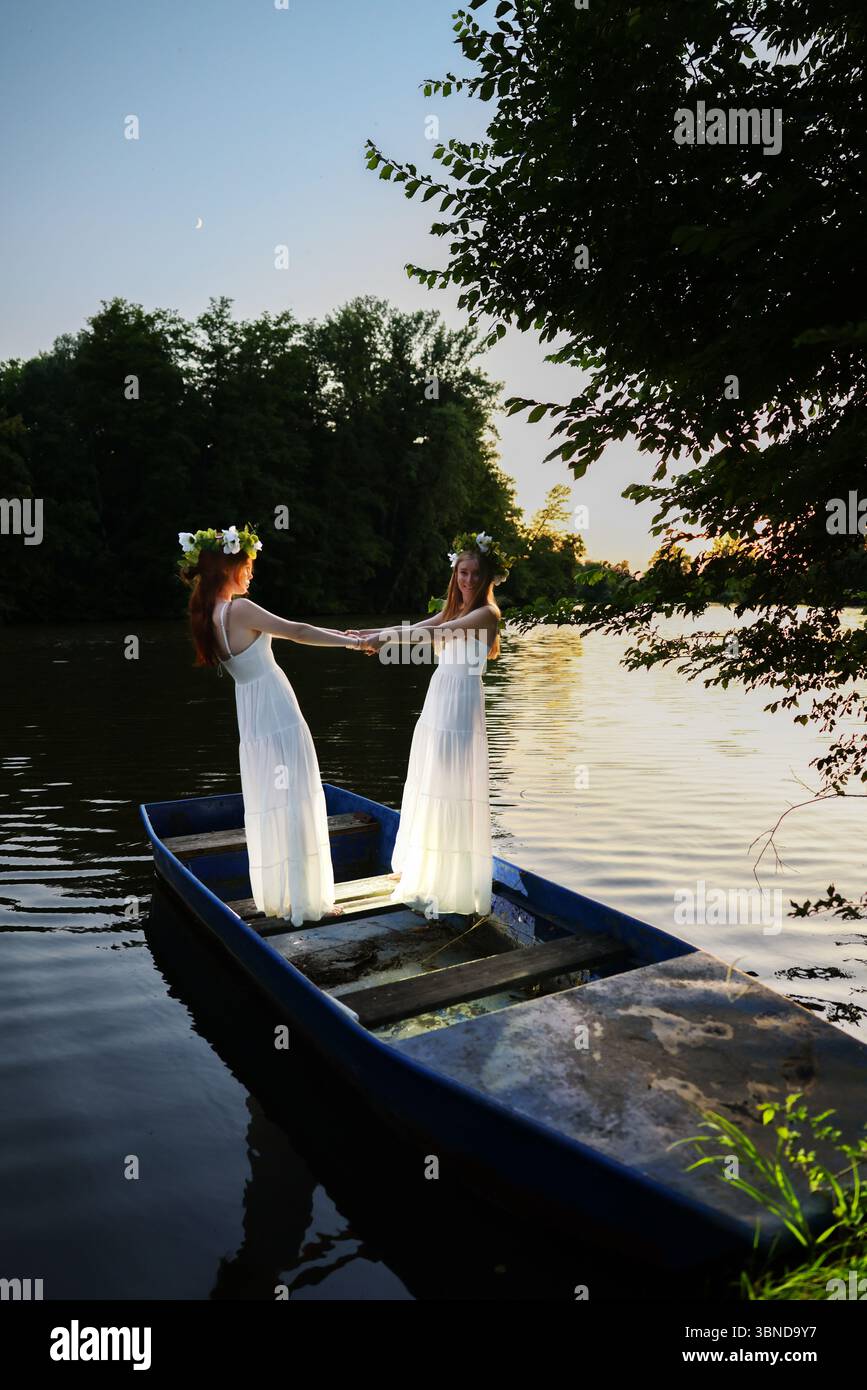 Midsummer Rituals Serene moment of tradition: girls in floral wreaths and white gowns ...
