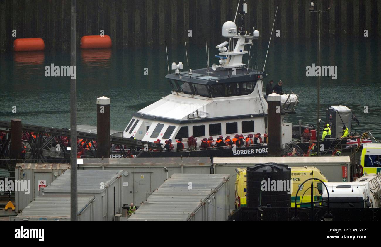 A group of people thought to be migrants are brought in to Dover, Kent, from a Border Force vessel following a small boat incident in the Channel. Picture date: Wednesday July 2, 2025. Stock Photo