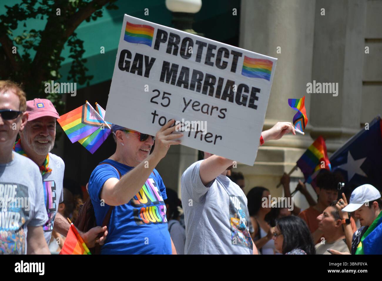Married couple marching in the annual New York city Pride Parade. Stock Photo