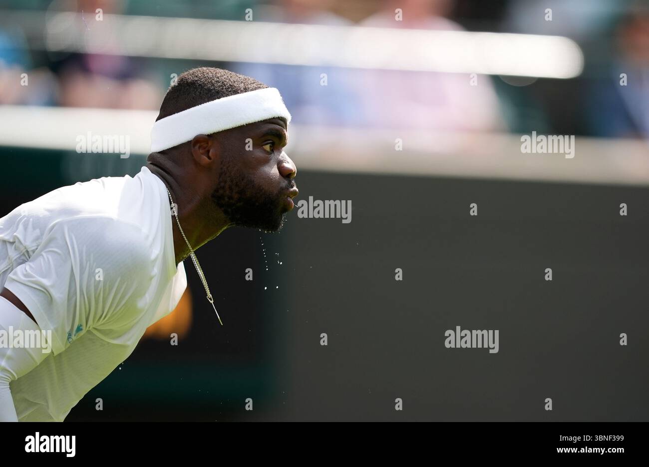 Frances Tiafoe in action against Cameron Norrie on day three of the