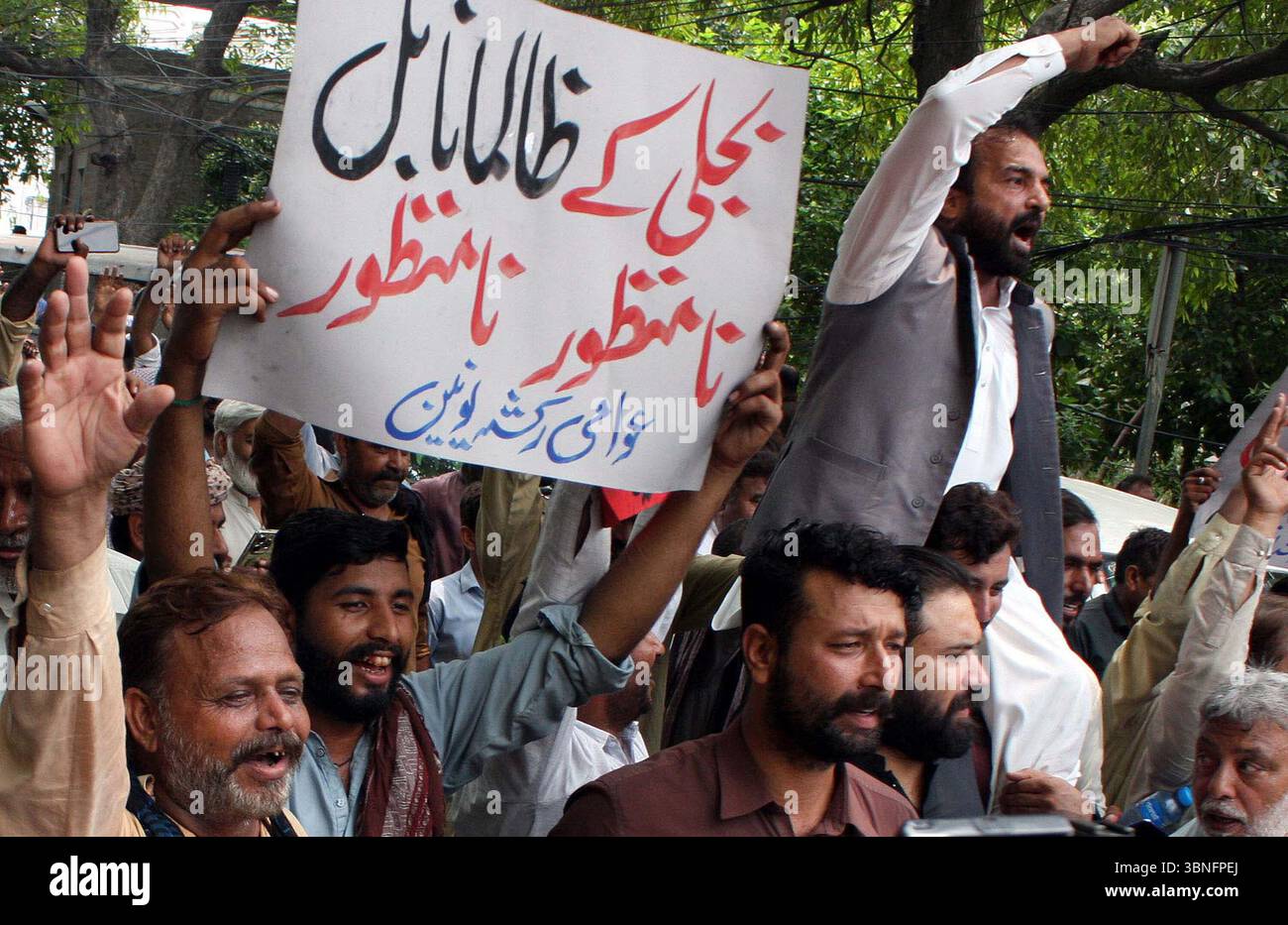 LAHORE, PAKISTAN, JUL 02: Members of Awami Rickshaw Union are holding ...