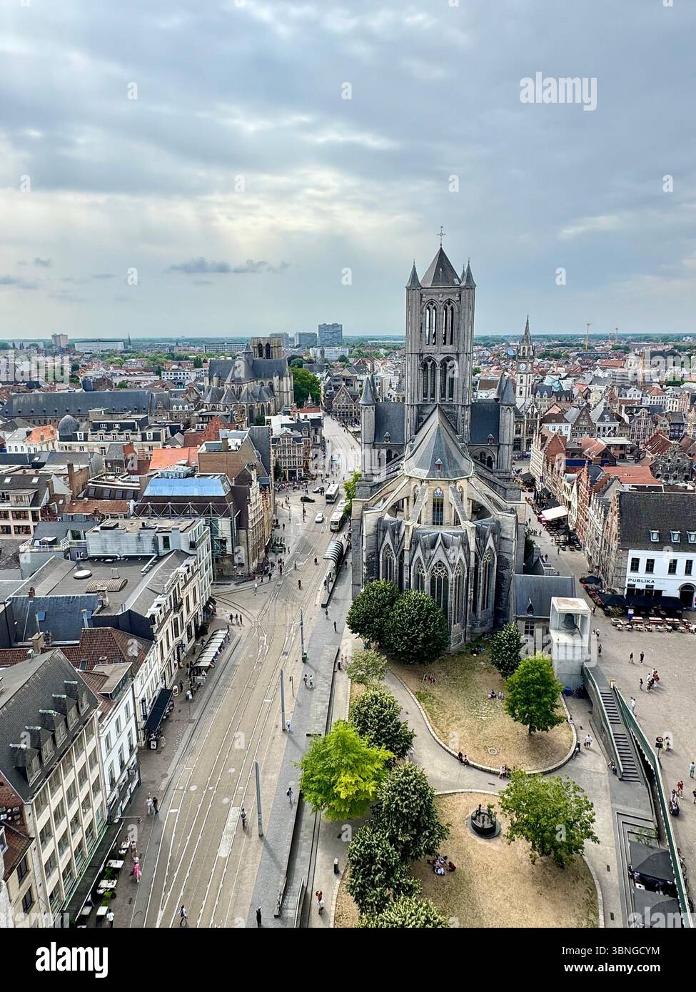 Panoramic view of St. Nicholas’ Church (Sint‑Niklaaskerk) and Ghent cityscape from inside the Belfry of Ghent (Het Belfort van Gent), Belgium. - Smartphone Captured Stock Image