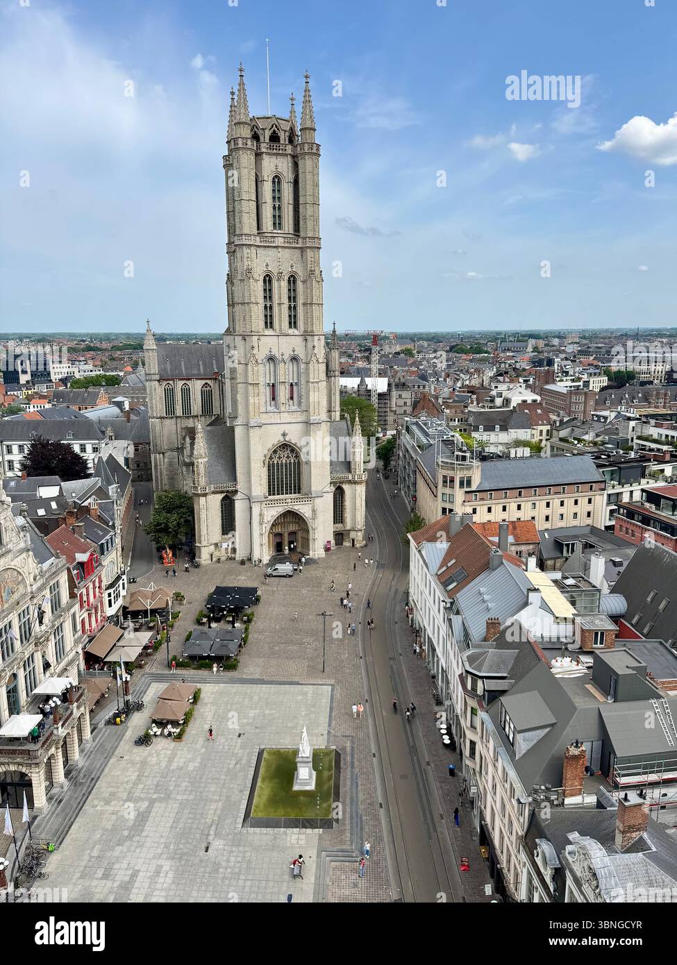View of St. Bavo’s Cathedral (Sint‑Baafskathedraal) and Ghent rooftops from the Belfry of Ghent (Het Belfort van Gent), Belgium. - Smartphone Captured Stock Image
