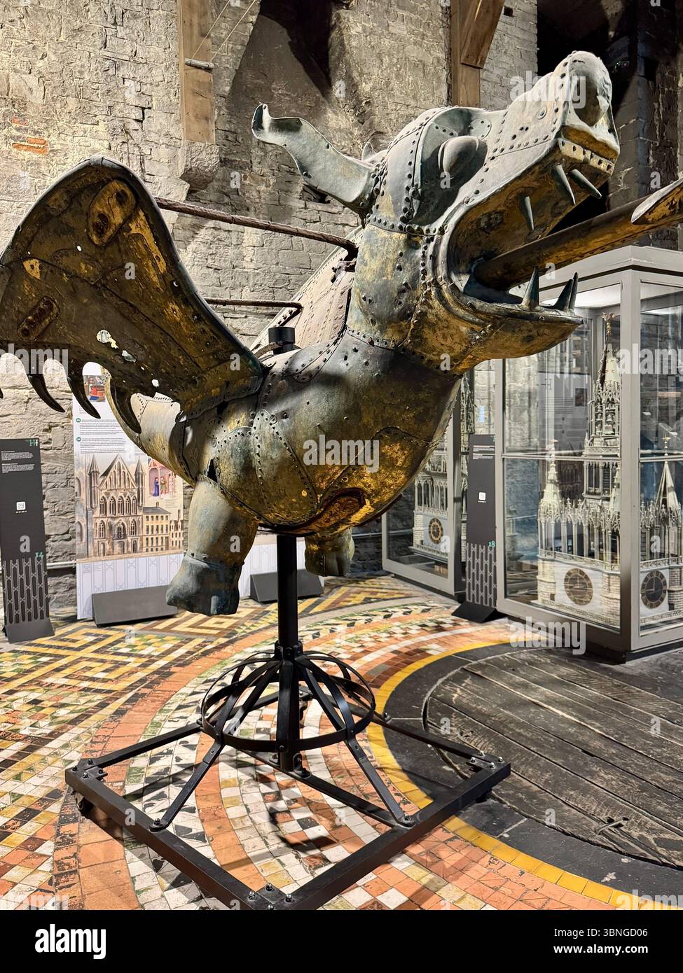 Medieval gilded dragon weather vane displayed inside the Belfry of Ghent (Belfort van Gent) museum, Belgium. - Smartphone Captured Stock Image