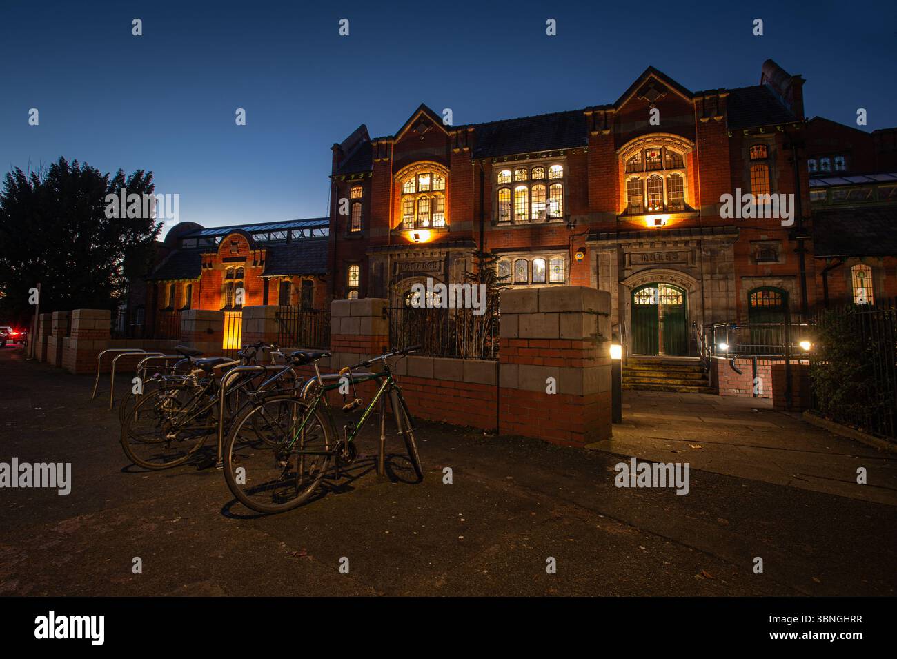 a-night-time-exterior-view-of-withington-leisure-centre-in-withington