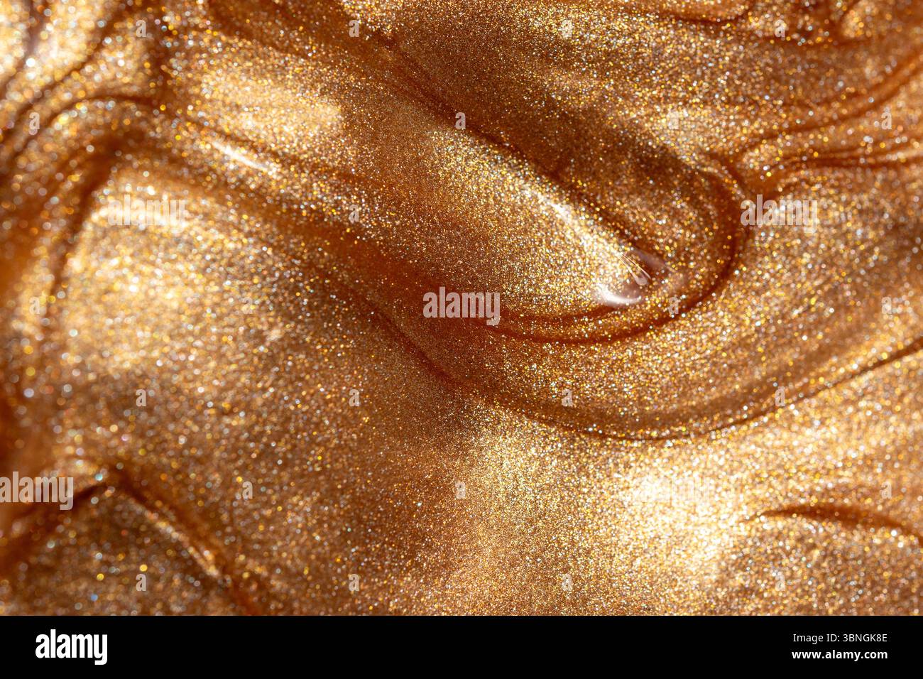Texture background with golden shimmering cosmetic body spray or gel ...