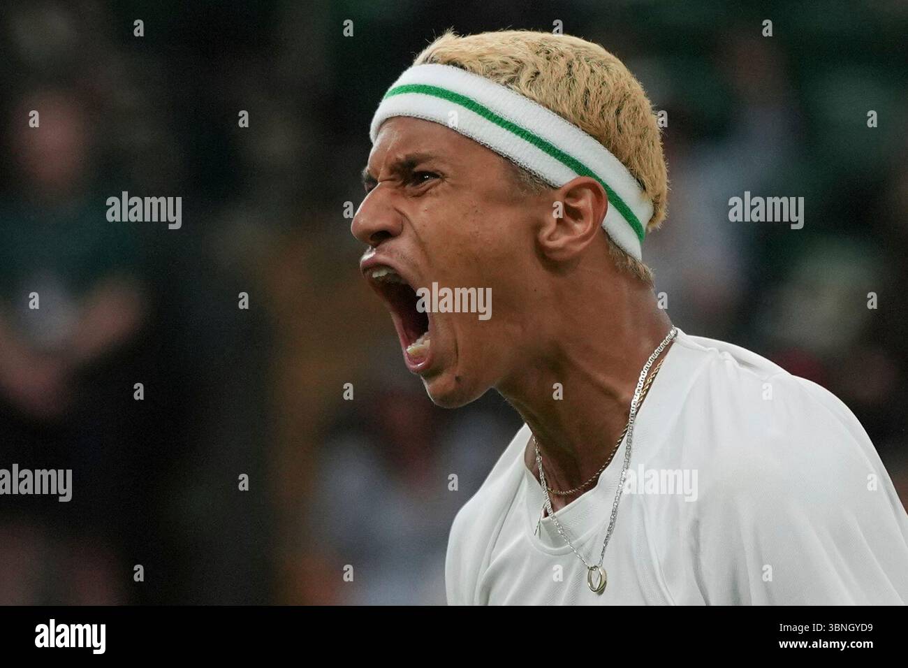 Gabriel Diallo of Canada reacts after winning the fourth set against
