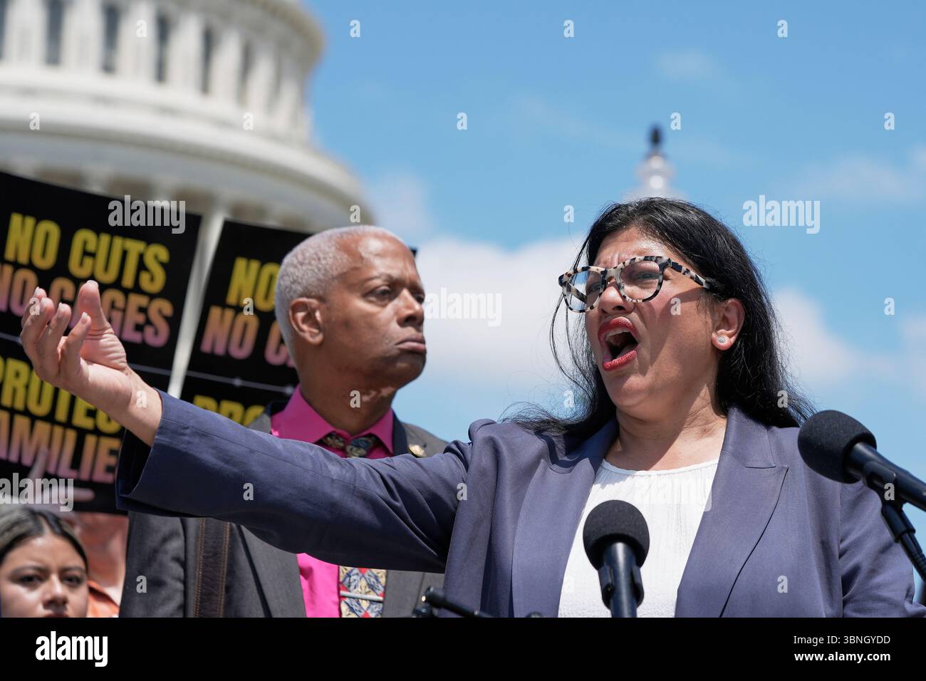 Rep. Rashida Tlaib, D-Mich., right, speaks during a news conference at