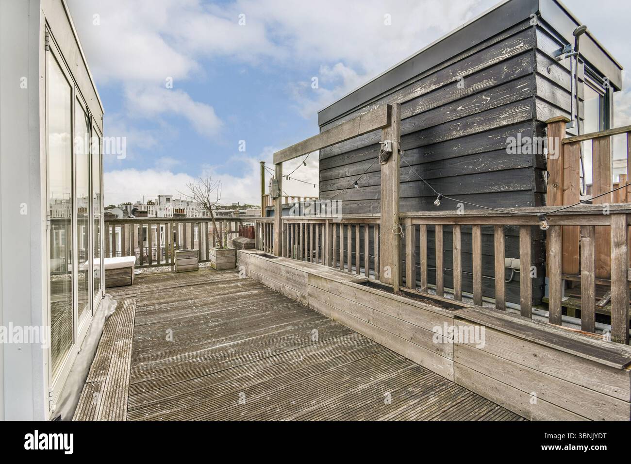 Fresh Look at A Spacious Urban Rooftop Terrace Featuring Wooden Decking A Modern