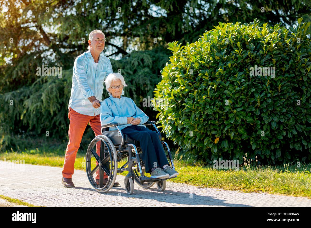 Elderly woman comfortably seated hi-res stock photography and images ...