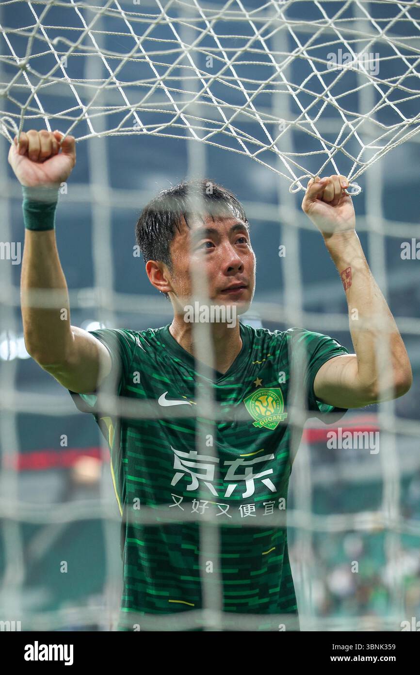 Beijing Guoan Home Camiseta de Fútbol 2021. Sponsored by Sinobo Group