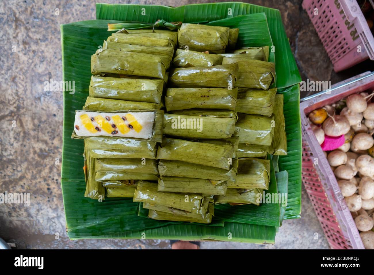Traditional Banana Leaf Wrapped Sticky Rice with Banana Filling in ...