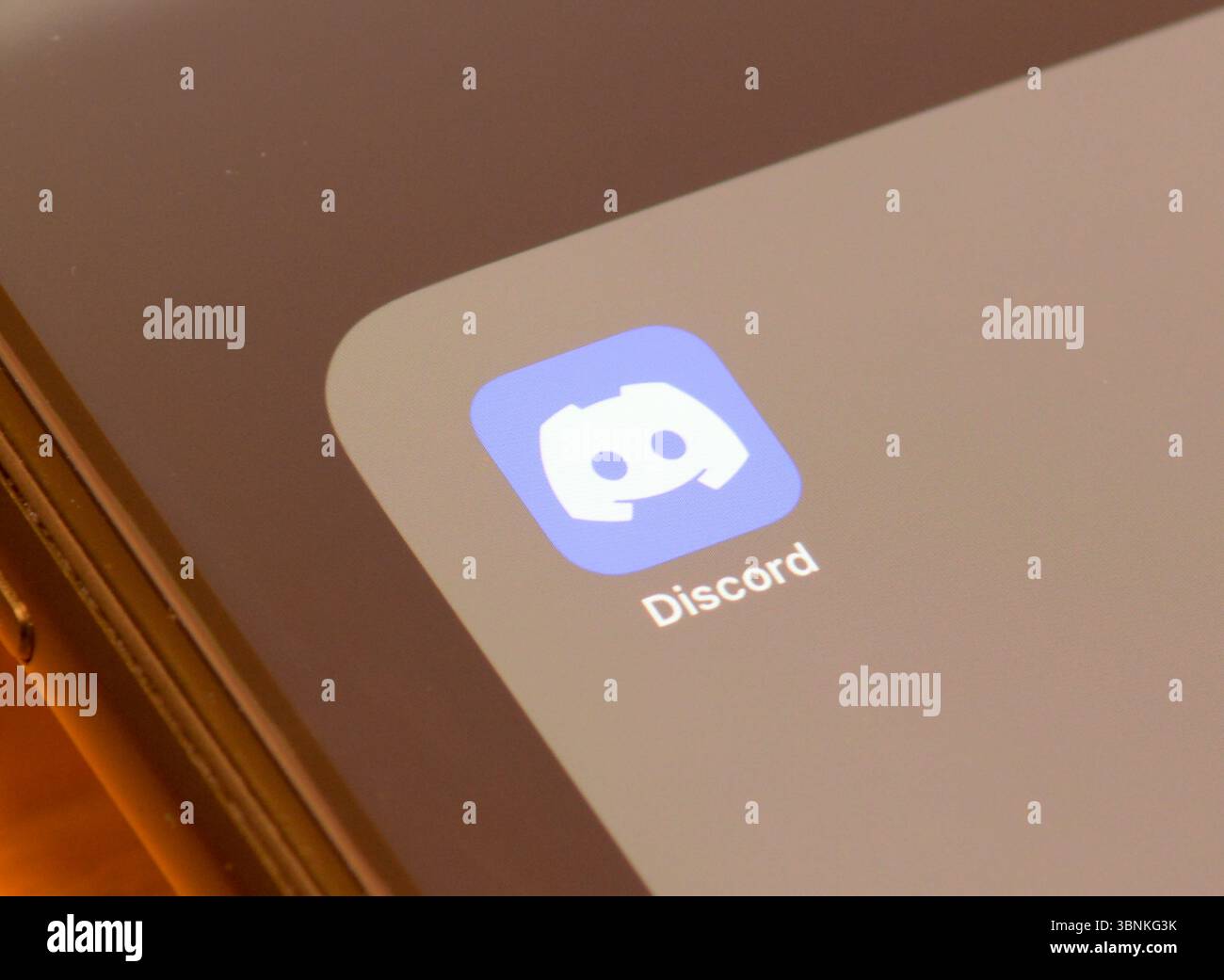 Discord instant messaging and VoIP social platform app on smartphone ...