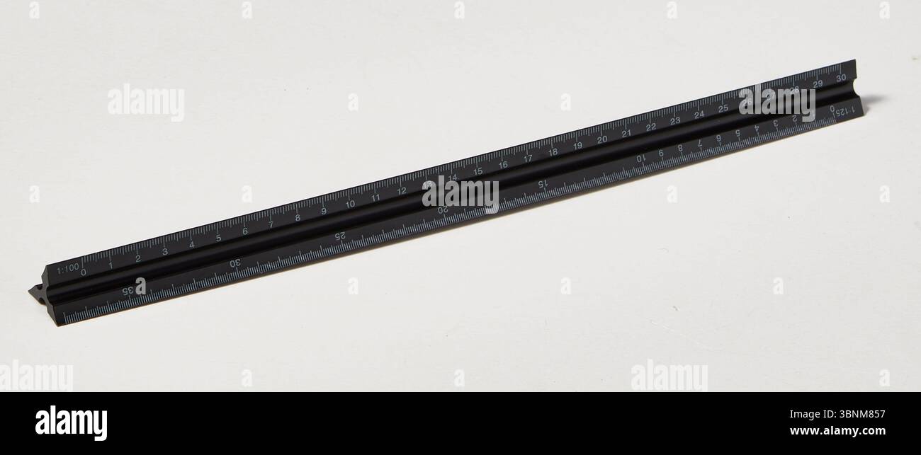 Tilted Ruler triangular ruler is tilted to reveal details Stock Photo - Alamy