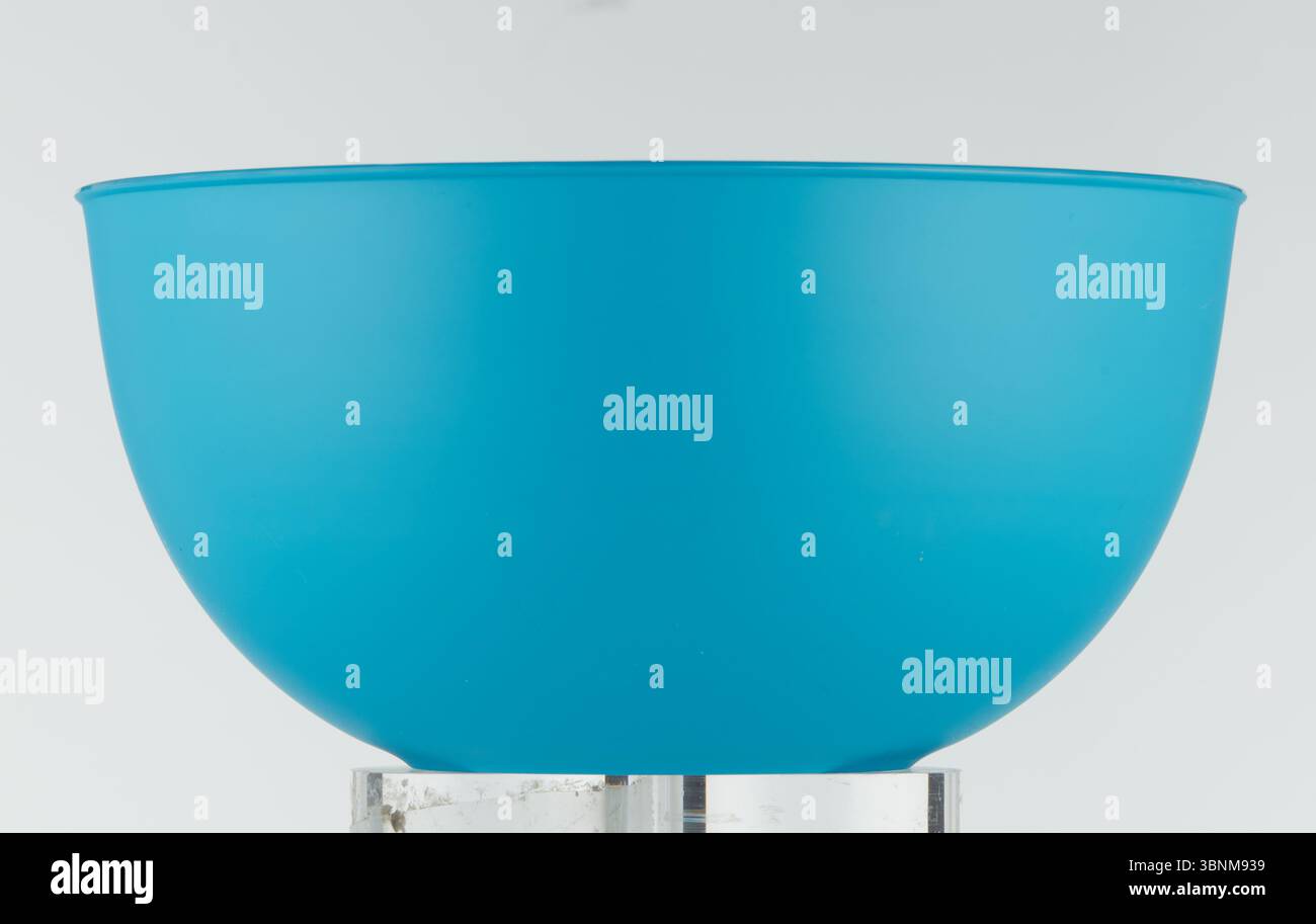 Empty Solid Blue Plastic Cup with Straight Angle Stock Photo