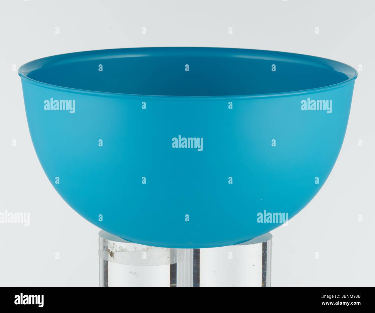 Empty solid blue plastic cup Stock Photo