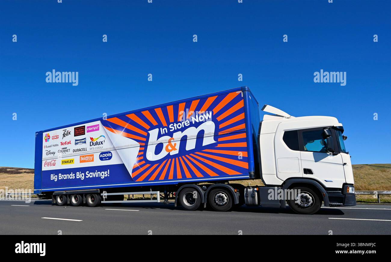 B & M Limited HGV, travelling at speed on the M6 Motorway Southbound carriageway, Shap, Cumbria, England, United Kingdom, Europe. Stock Photo