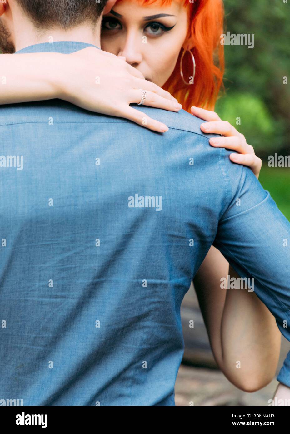 Woman hugging shoulder arms hi-res stock photography and images - Alamy
