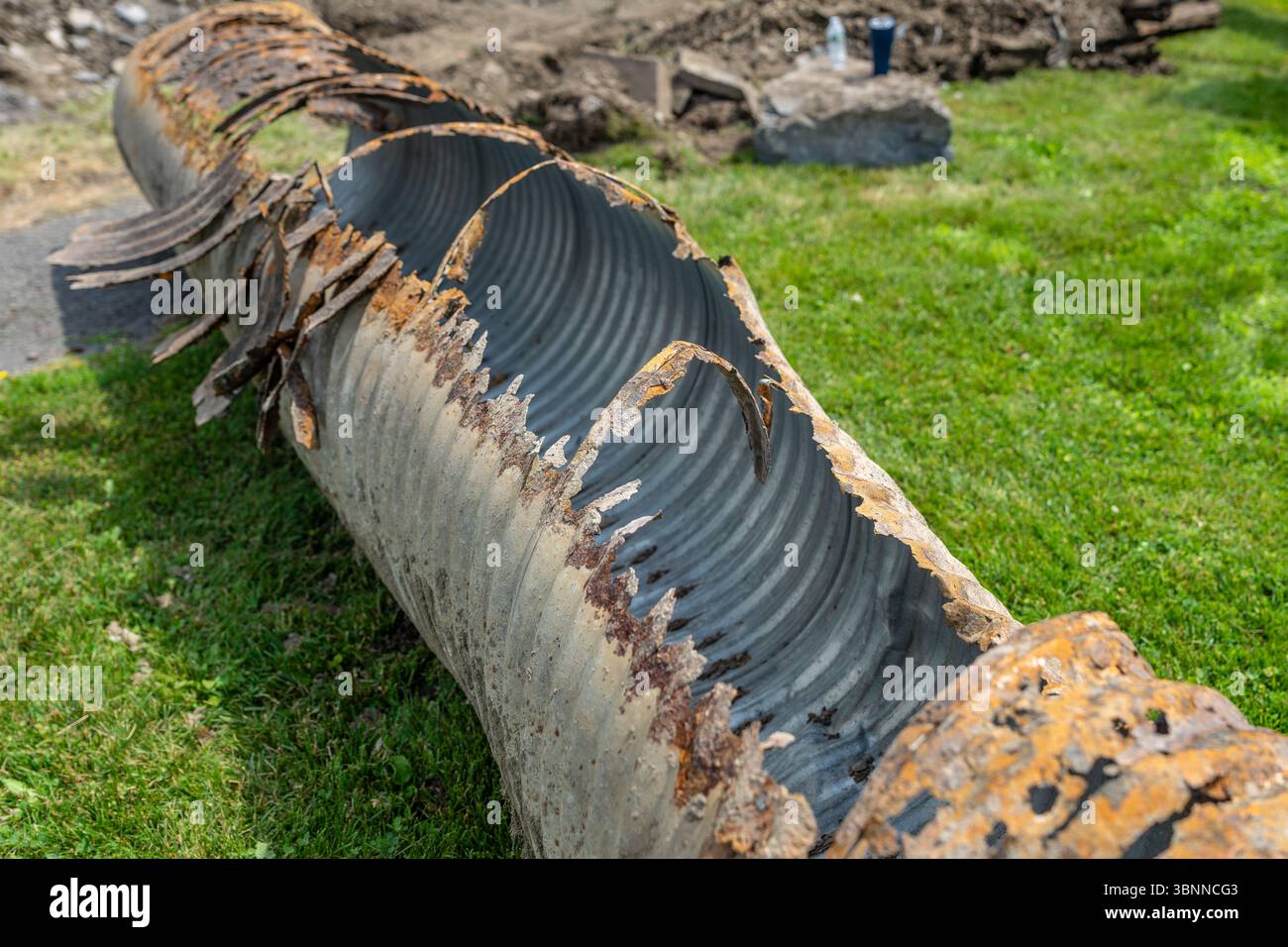 Infrastructure photo of rusted out corrugated metal pipe, CMP, drainage ...