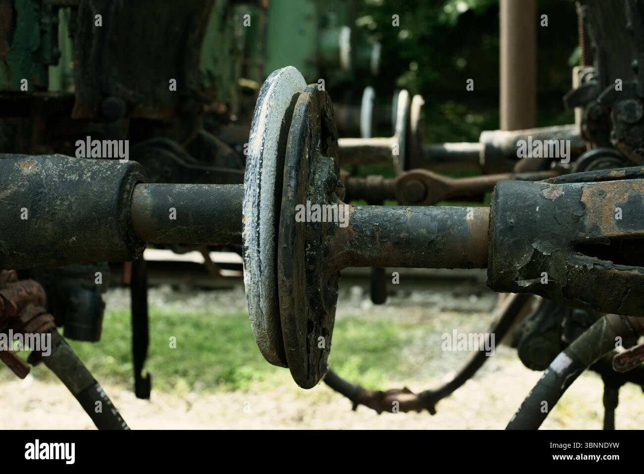 Steel Rods Train Train coupler with a central mechanical buffer plate, rusted metal ...