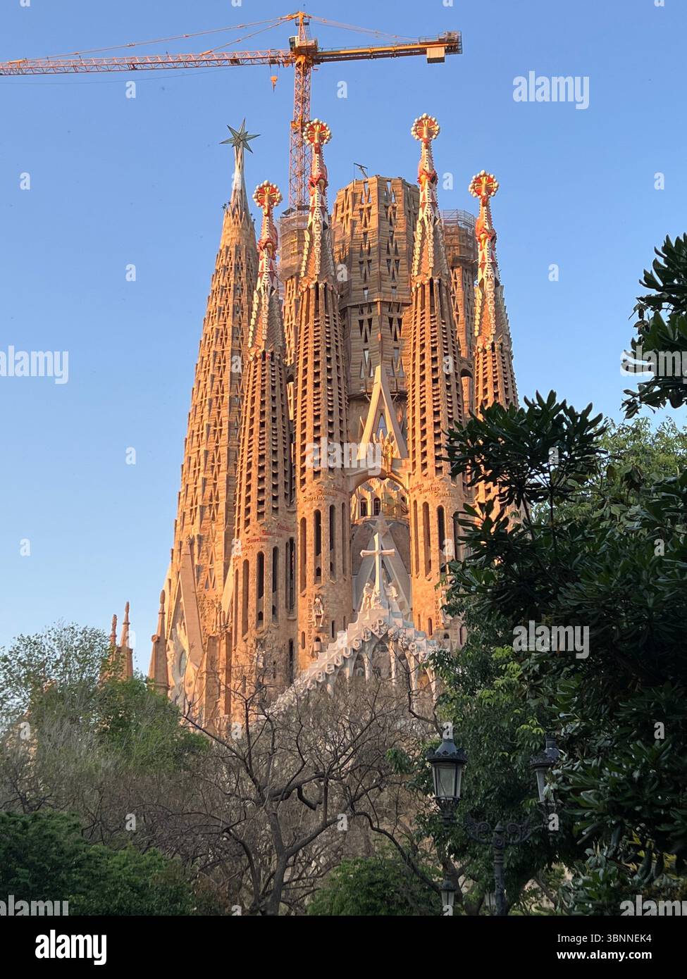 Sagrada Familia, an iconic and magnificent basilica in the sunset. - Smartphone Captured Stock Image