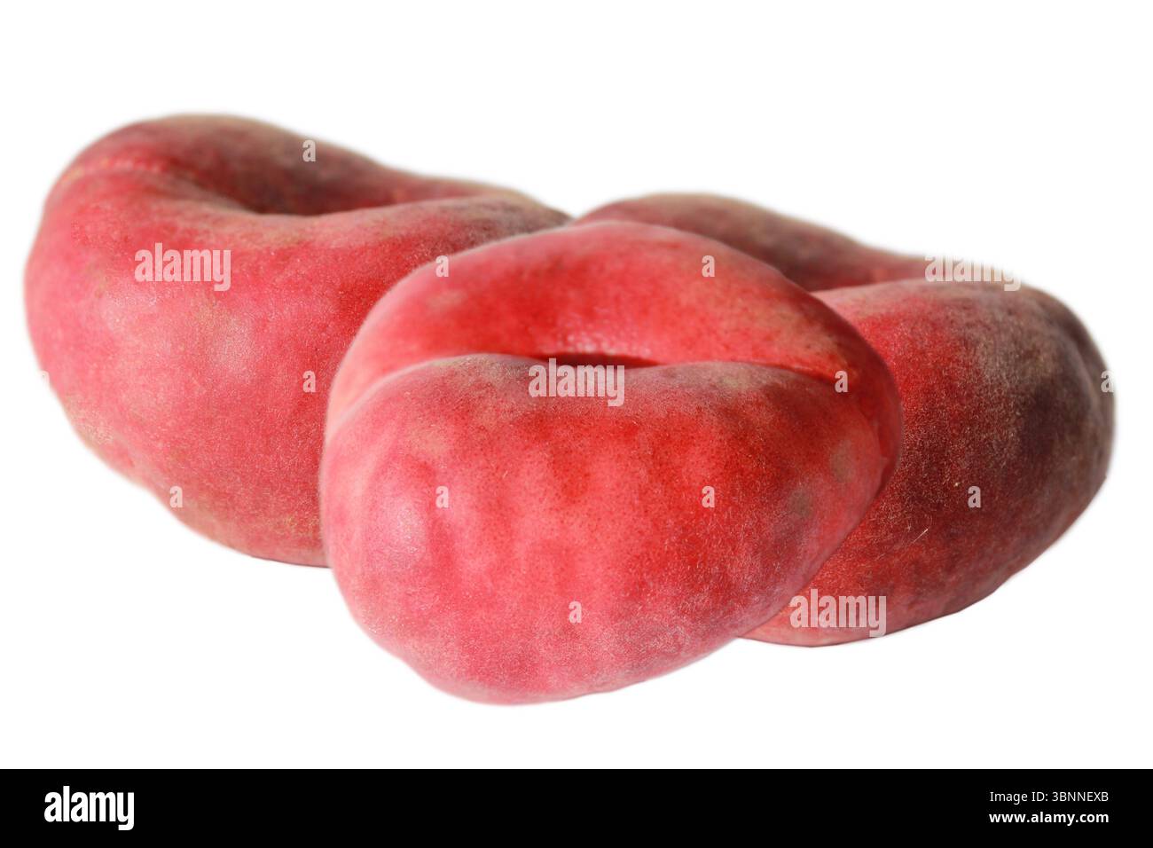 Three chinese flat donut peaches  on white background. Stock Photo