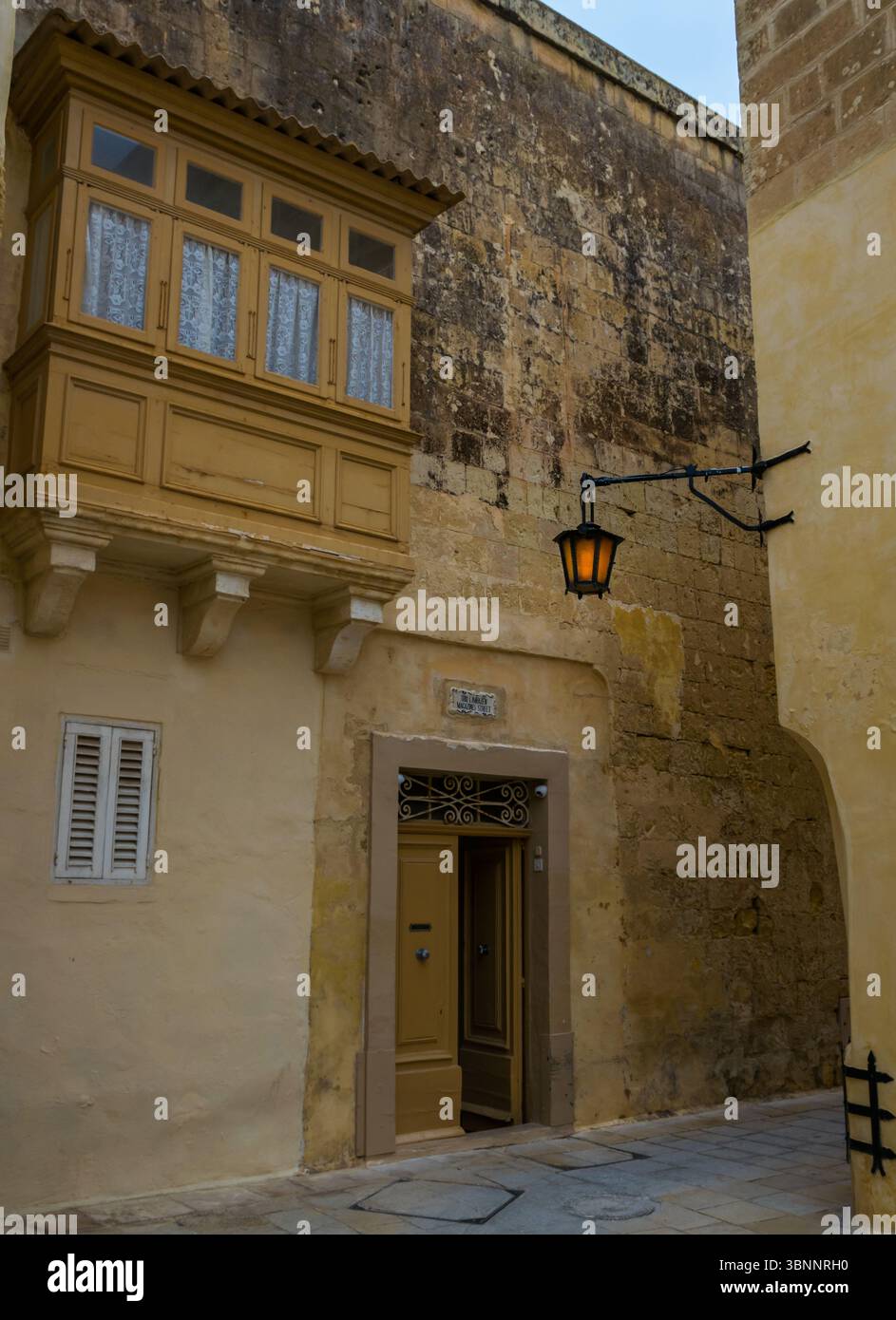 Mdina Malta February 10 2024 Medieval Limestone House With Wooden mdina-malta-february-10-2024-medieval-limestone-house-with-wooden