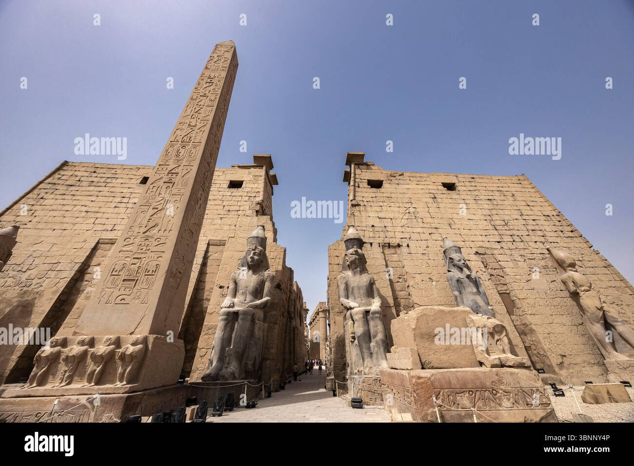 Luxor temple, first pylon(tower gate), obelisk, colossal statues of ...