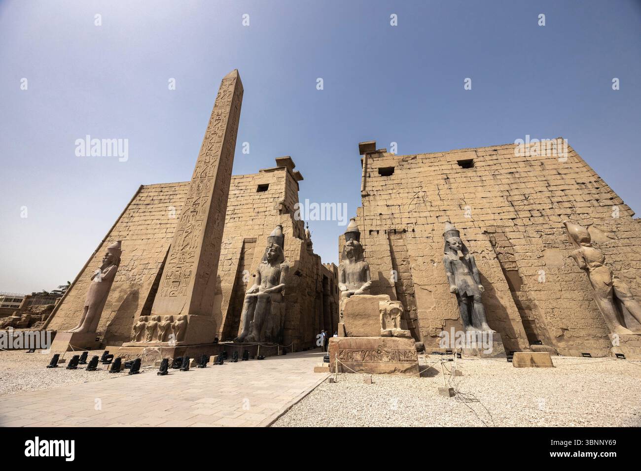 Luxor temple, first pylon(tower gate), obelisk, colossal statues of ...