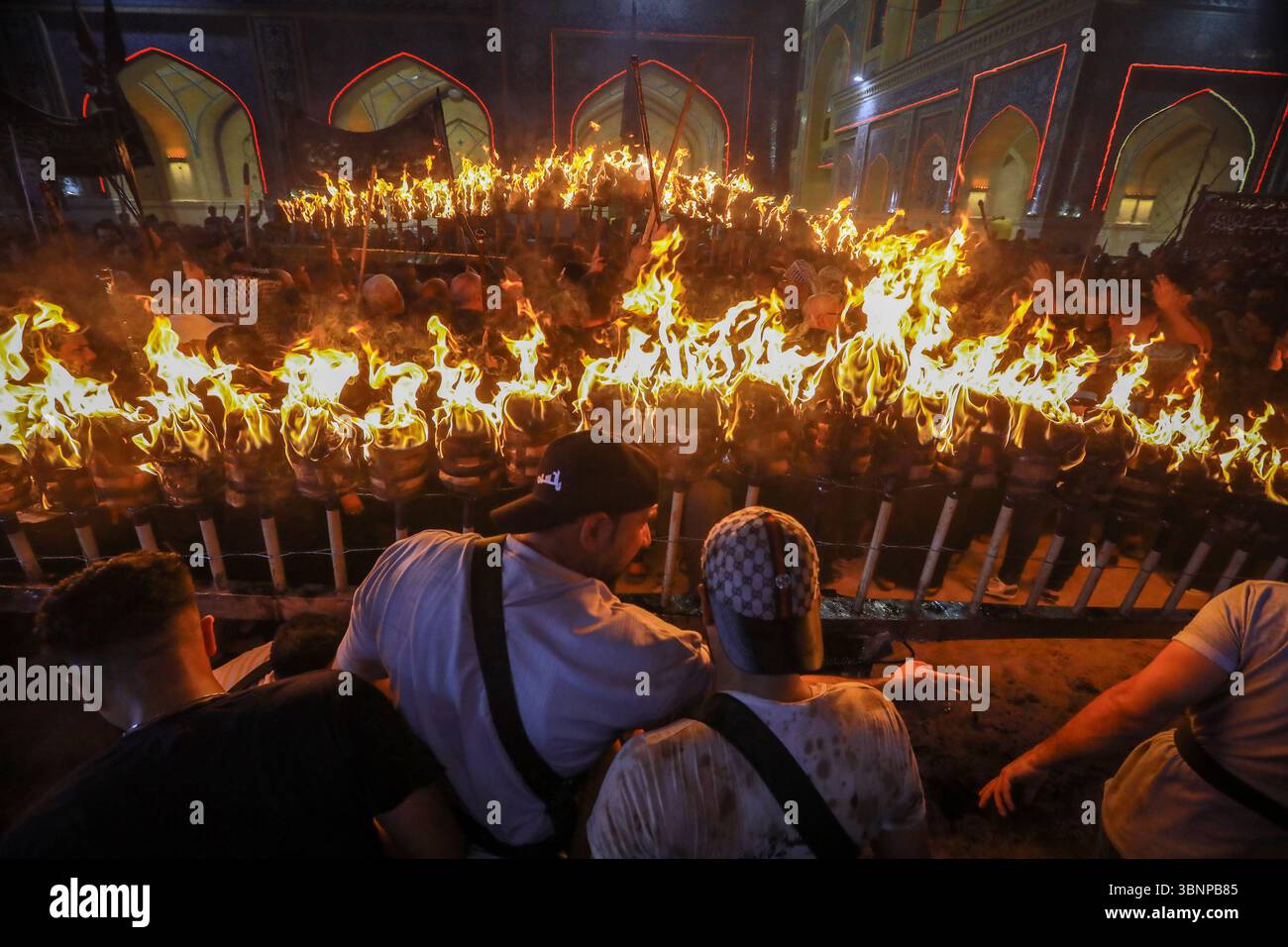 Najaf, Iraq. 03rd July, 2025. Shiite Muslims perform mourning rituals ...