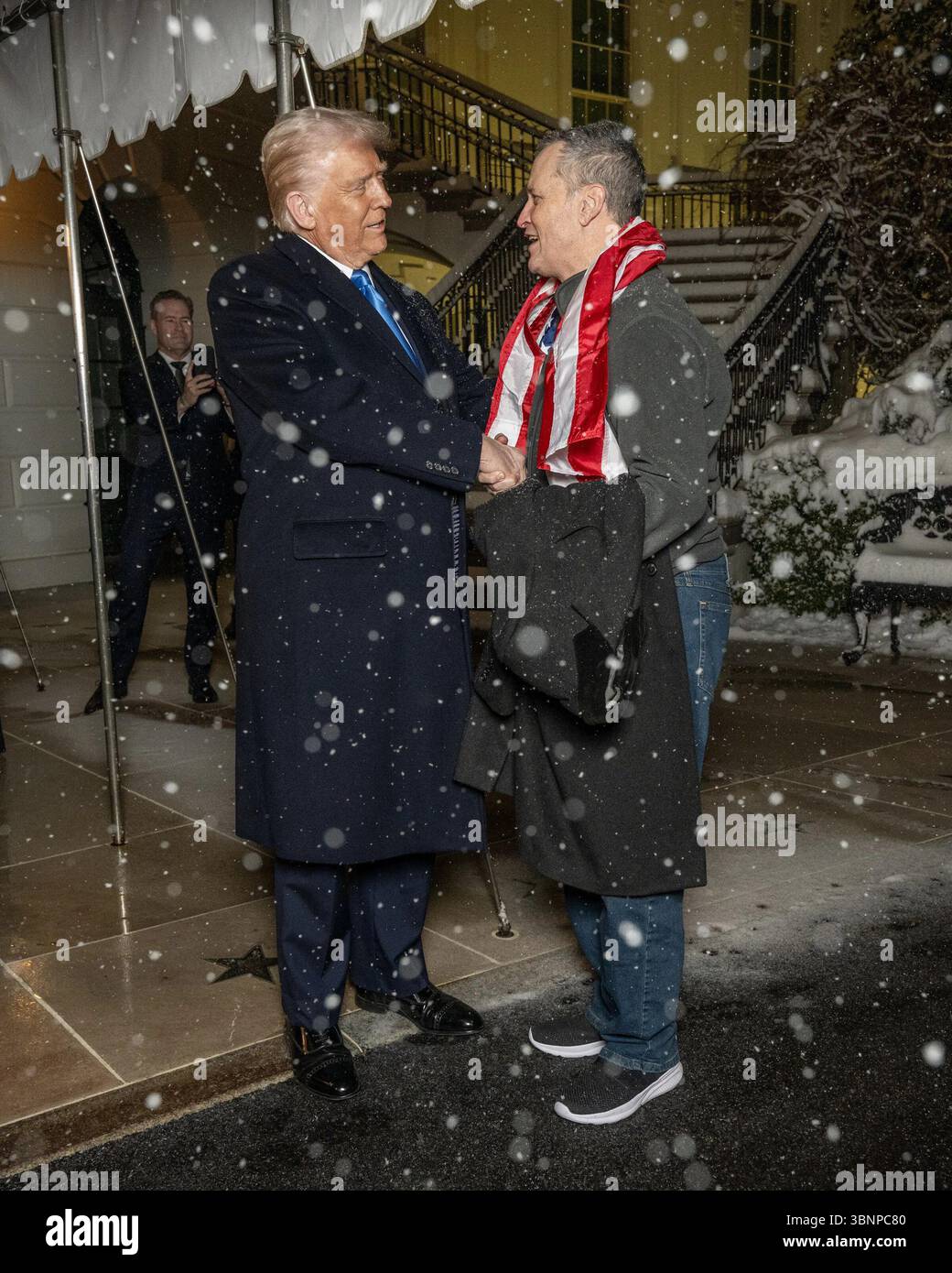 President Trump greets Marc Fogel outside the White House after securing his release from Russia. February 11, 2025. Image furnished by the White House. Stock Photo