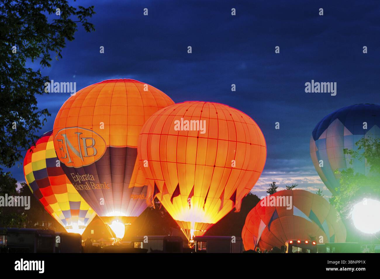 Multiple Hot Air Balloon Glow as Balloons Fire There Propane Tanks and ...