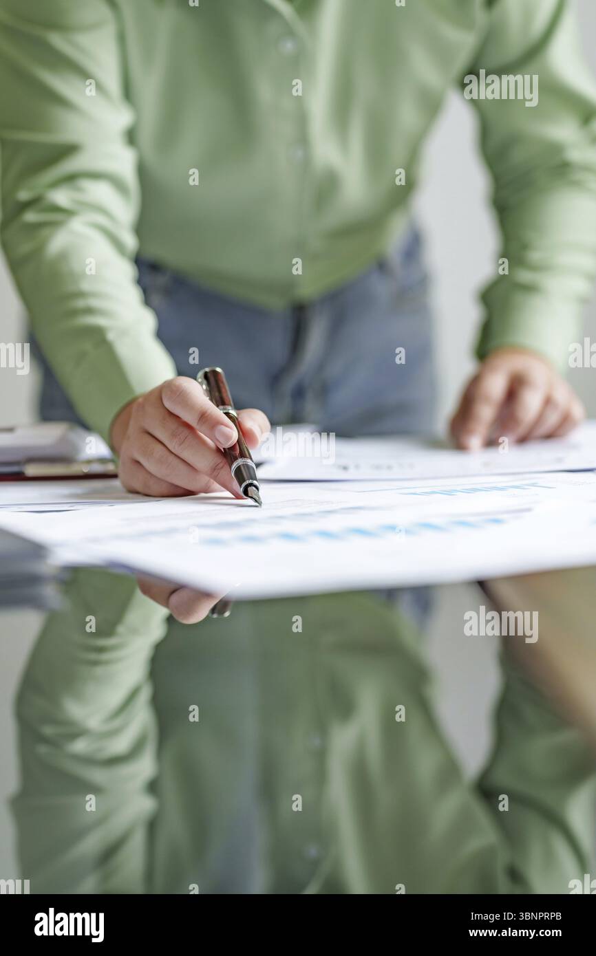 Close up Millennial confident Female working in creative office Stock Photo
