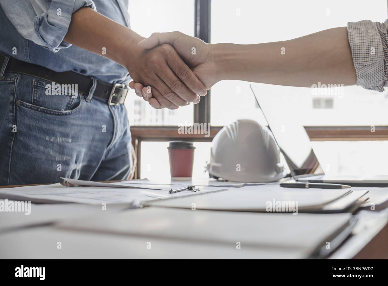 Man architect working On the desk construction project ideas architects engineer Concept Stock Photo