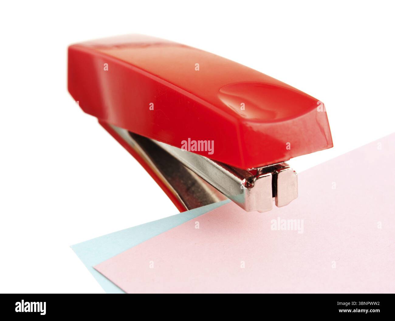 Red stapler isolated on white background Stock Photo - Alamy