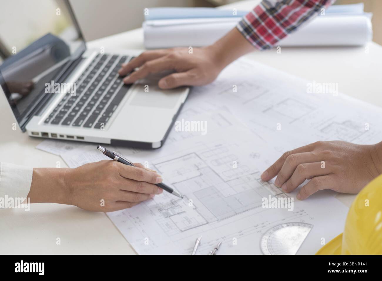 Architects interior designer hands working with Blue prints and ...
