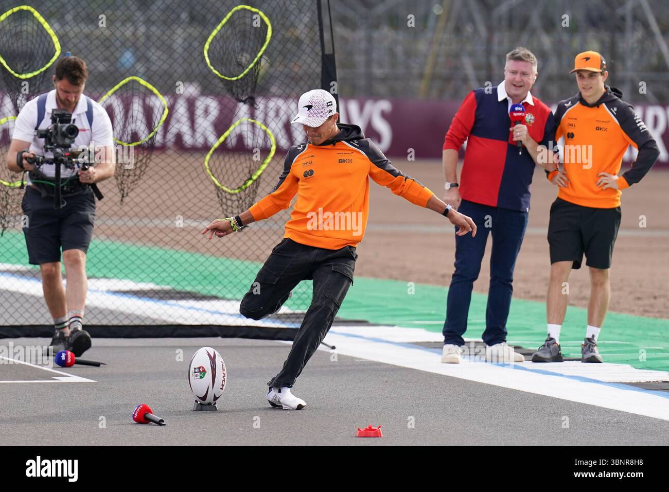 Lando Norris 4 (GBR), McLaren MCL39 kicks a rugby ball during Sky F1 show. Media Day at the QATAR AIRWAYS FORMULA 1 BRITISH GRAND PRIX 2025, Silverstone Circuit, Silverstone, England, United Kingdom on 3 July 2025 Credit: Robbie Hoad/Every Second Media Credit: Every Second Media/Alamy Live News Stock Photo