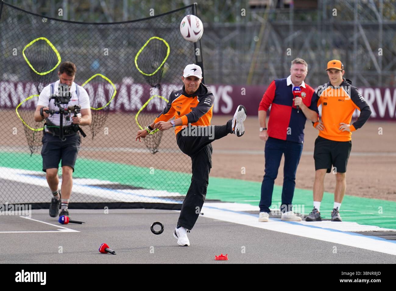 Lando Norris 4 (GBR), McLaren MCL39 kicks a rugby ball during Sky F1 show. Media Day at the QATAR AIRWAYS FORMULA 1 BRITISH GRAND PRIX 2025, Silverstone Circuit, Silverstone, England, United Kingdom on 3 July 2025 Credit: Robbie Hoad/Every Second Media Credit: Every Second Media/Alamy Live News Stock Photo