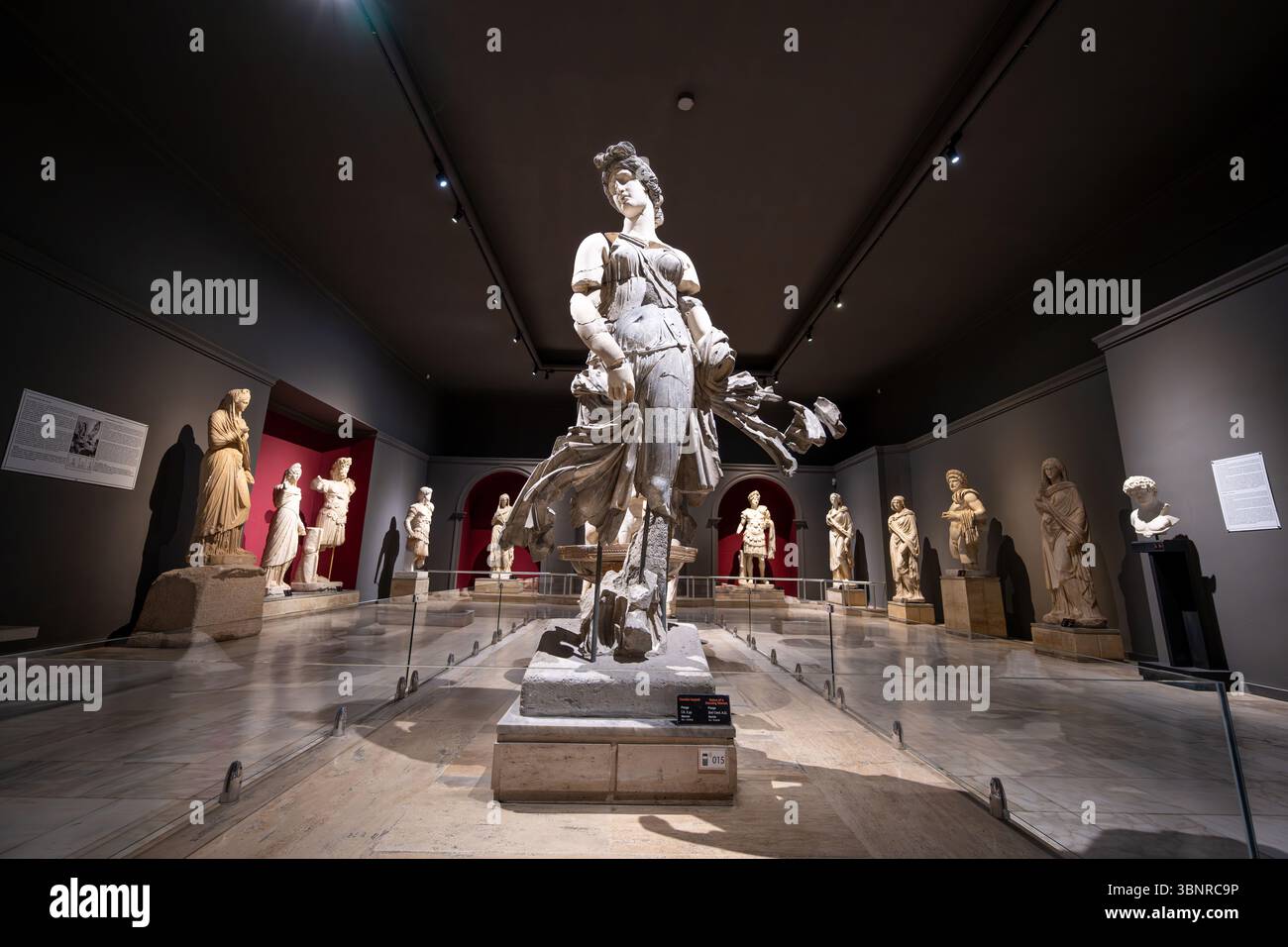 Antalya, Turkey - June 25, 2025: Magnificent Greek ancient dancing woman statue in the gallery hall of Antalya Archaeological Museum Stock Photo