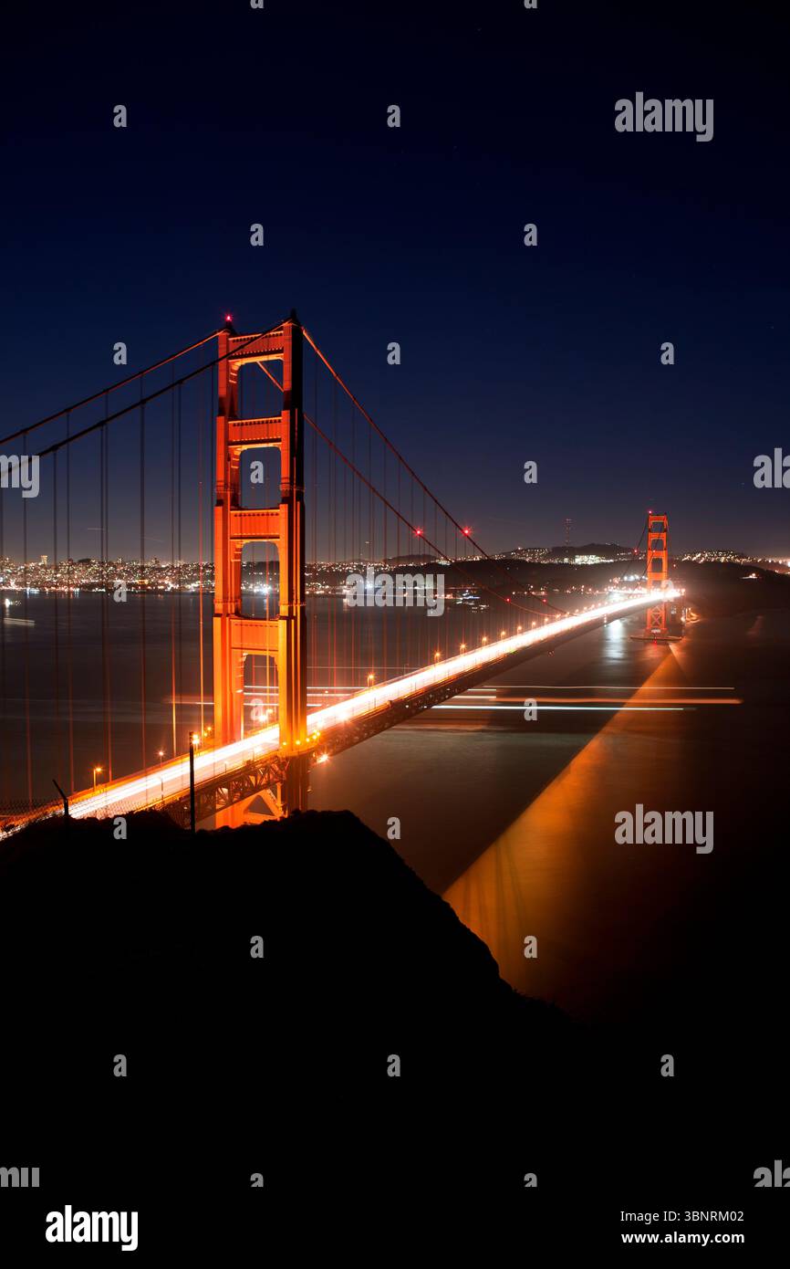 Cars on the Golden Gate suspension Bridge and San Francisco skyline in ...