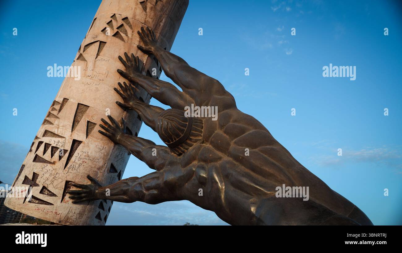 Efforts to preserve an iconic Iraqi monument that features raised hands ...