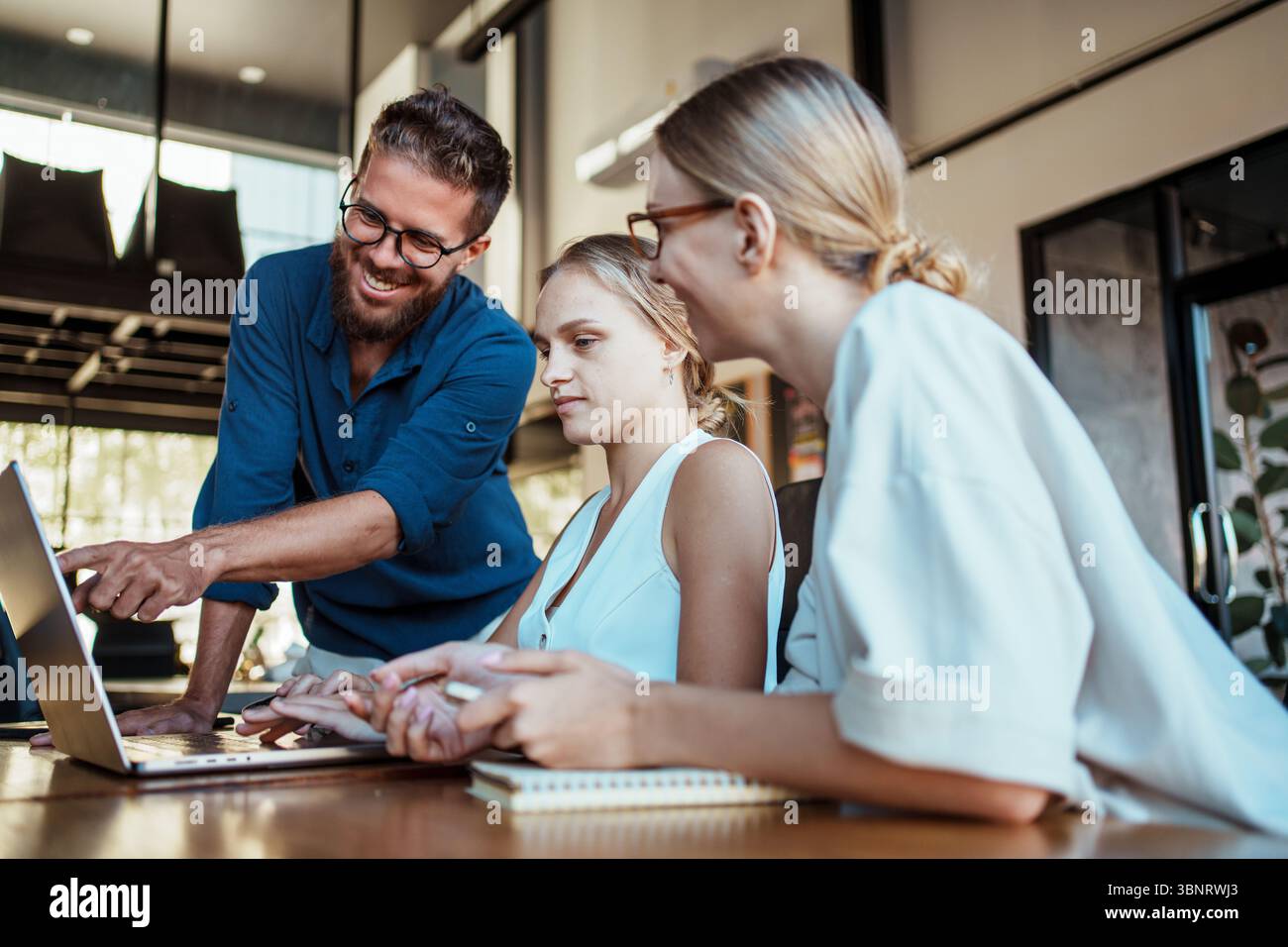 Collaborative work sessions in modern office spaces boost team ...