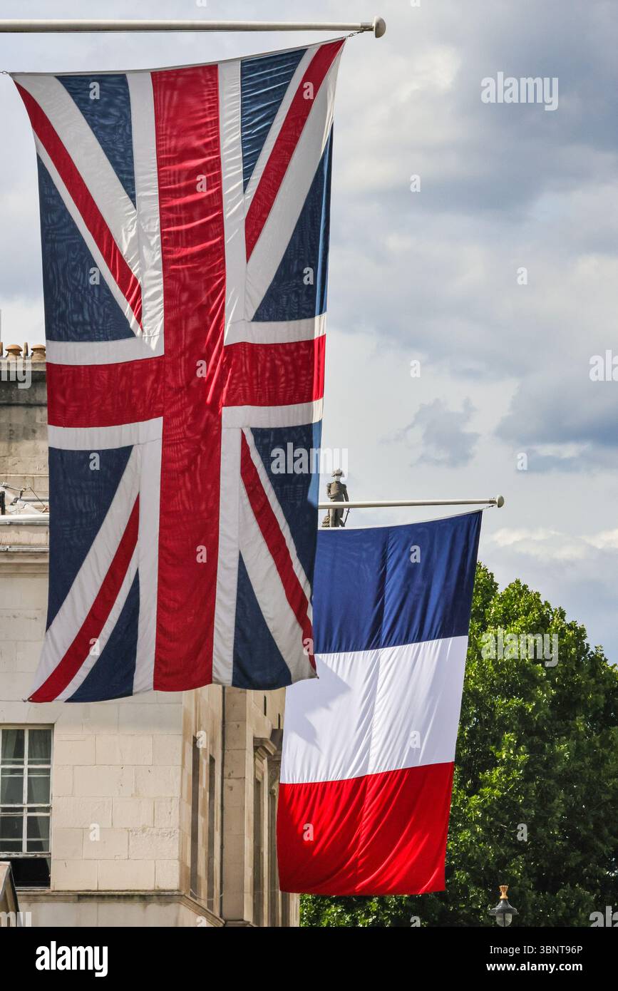 London, UK. 03rd July, 2025. The tricolour National Flag of France has been raised alongside the Union Jack Flag, the national flag of the United Kingdom, outside Horse Guards on Whitehall, in preparation for the State Visit by the President of France, Emmanuel Macron next week. Credit: Imageplotter/Alamy Live News Stock Photo