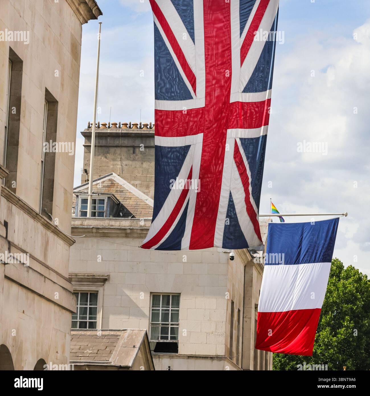 London, UK. 03rd July, 2025. The tricolour National Flag of France has been raised alongside the Union Jack Flag, the national flag of the United Kingdom, outside Horse Guards on Whitehall, in preparation for the State Visit by the President of France, Emmanuel Macron next week. Credit: Imageplotter/Alamy Live News Stock Photo