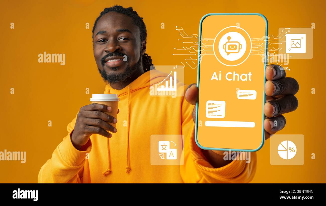 Smiling man showcasing AI chat application on smartphone while holding coffee in bright studio setting Stock Photo