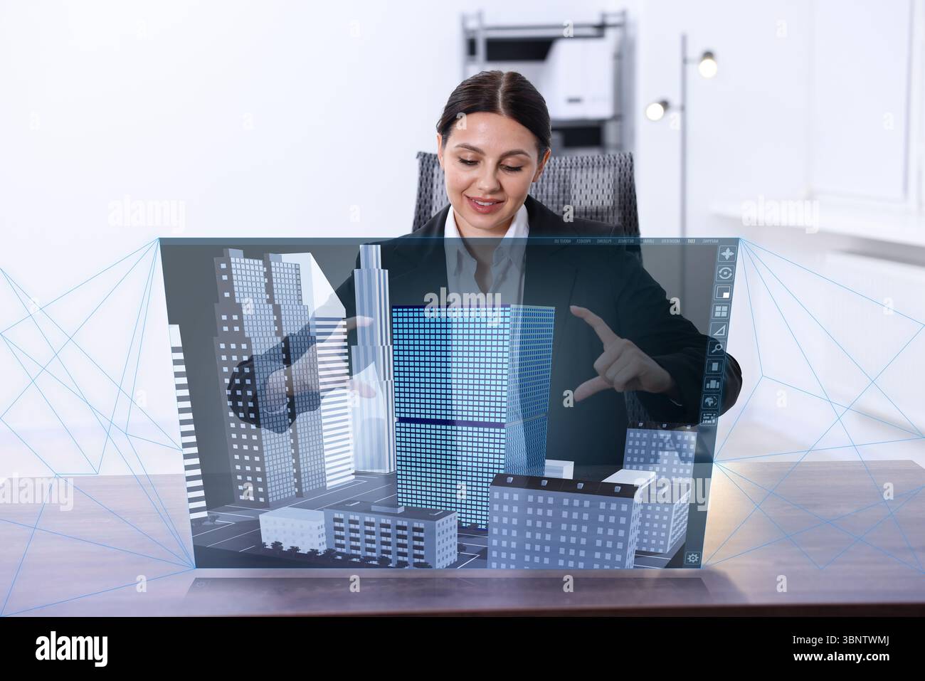Building information modelling. Woman using virtual screen in office Stock Photo