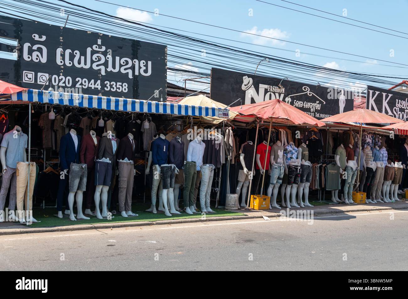 Open Frontage Example A long street of gents fashion open frontage shops with no glass lined ...