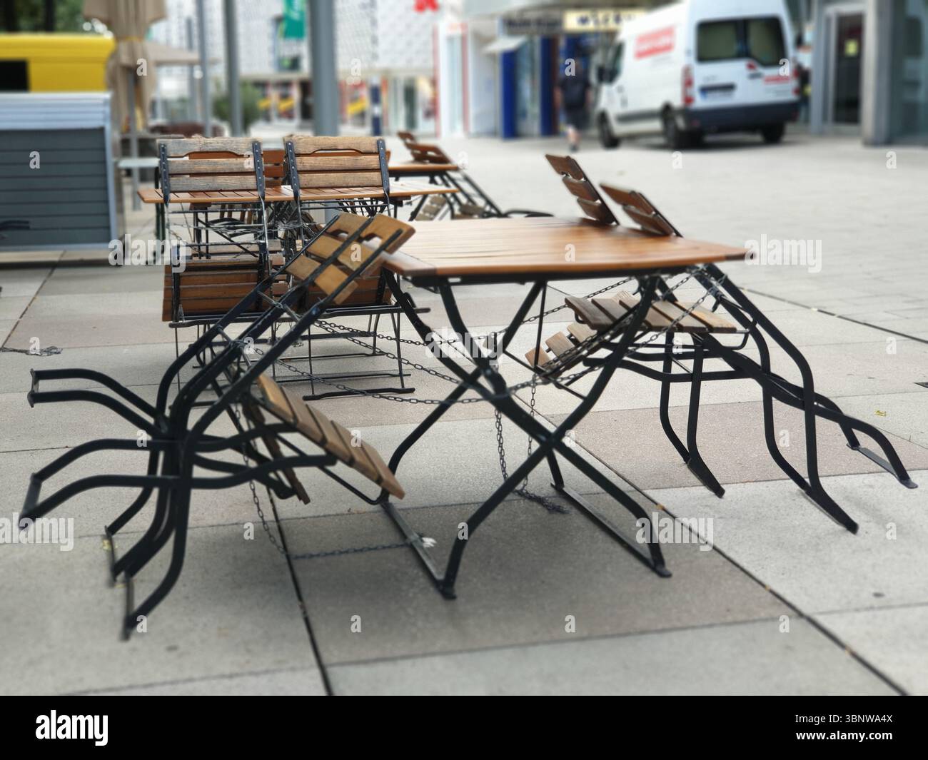 Stacked Tables and Chairs Outdoors Stock Photo