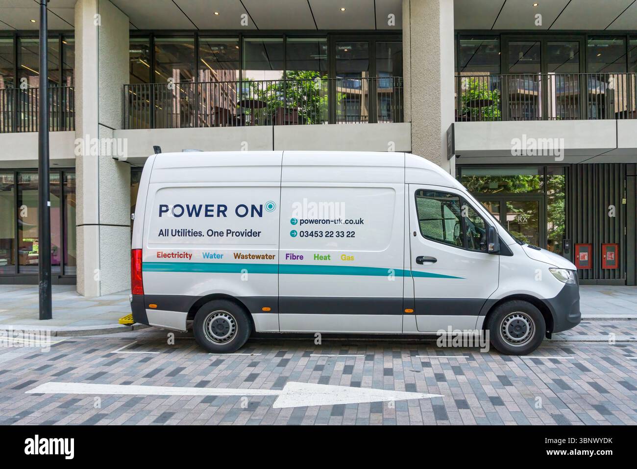 A van of utilities connections provider Power On.  King's Cross, London. Stock Photo